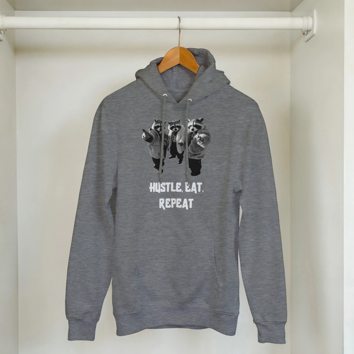 Hustle, Eat, Repeat Raccoon Hoodie - ROMAG Store