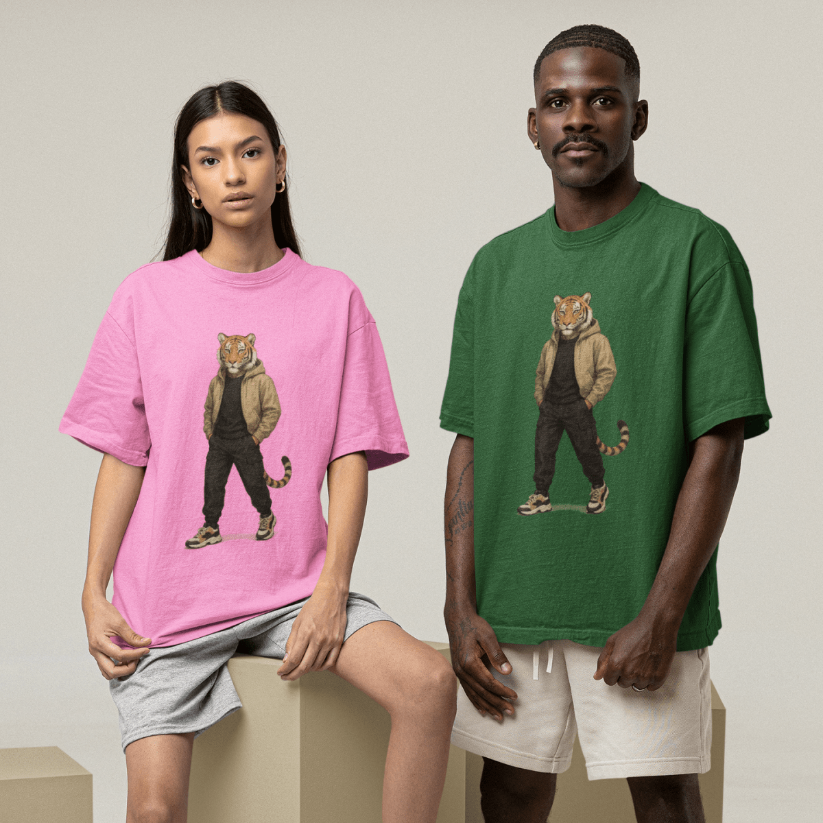 Two people wearing t-shirts with a graphic of a tiger in a streetwear outfit on a plain background